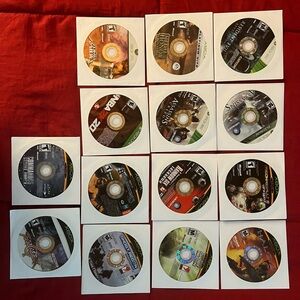 Assorted XBox/XBox360/xBoxone Game Discs - Black/Silver Disc Set